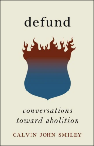 Cover of Defund: Conversations Toward Abolition by Calvin John Smiley, featuring an illustration of a blue badge fading into red flames at the top.