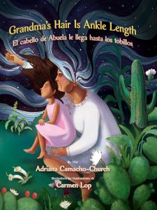 Cover of Grandma's Hair Is Ankle Length / El cabello de Abuela le llega hasta los tobillos by Adriana Camacho-Church, featuring an illustration of a grandmother sitting with a young child on her lap, her hair making up the starry night sky.