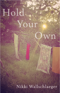 Cover of Hold Your Own by Nikki Wallschlaeger, featuring a photo of a laundry line with four pieces of fabric hanging in a forest with the sun peeking through the trees.