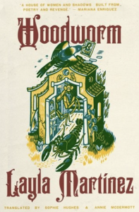 Cover of Woodworm by Layla Martinez, featuring a green and yellow illustration of a house with a scorpion crawling out of it and a bird sitting on top.