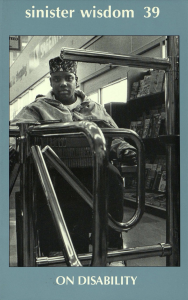 Cover of Sinister Wisdom 39: On Disability, featuring a photograph of a Black woman in a wheelchair behind an inaccessible turnstile in a Safeway.