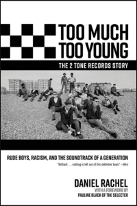 Cover of Too Much Too Young, the 2 Tone Records Story: Rude Boys, Racism, and the Soundtrack of a Generation by Daniel Rachel, featuring a black and white photograph of several men sitting on the ground.
