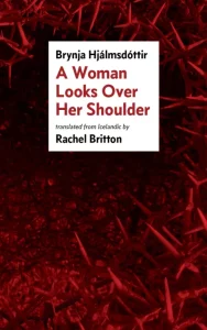 Cover of A Woman Looks Over Her Shoulder by Brynja Hjálmsdóttir, featuring a circle of overlapping red spikes surrounding a black center. 